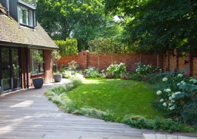 Wrap-around garden design in Allison Grove, Dulwich, 1