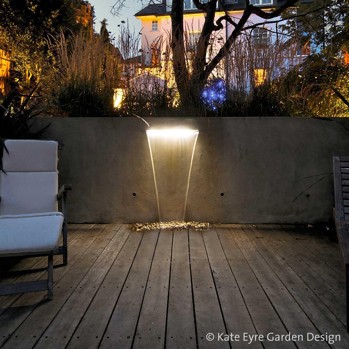 Large back garden design in Crystal Palace, South London, 12: evening view